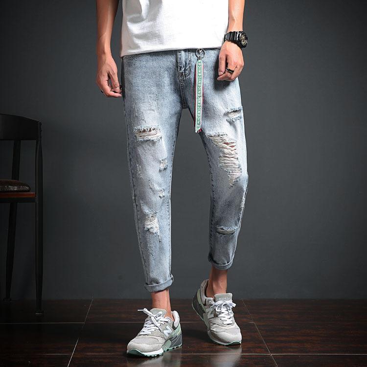 STRETCH DISTRESSED DENIM